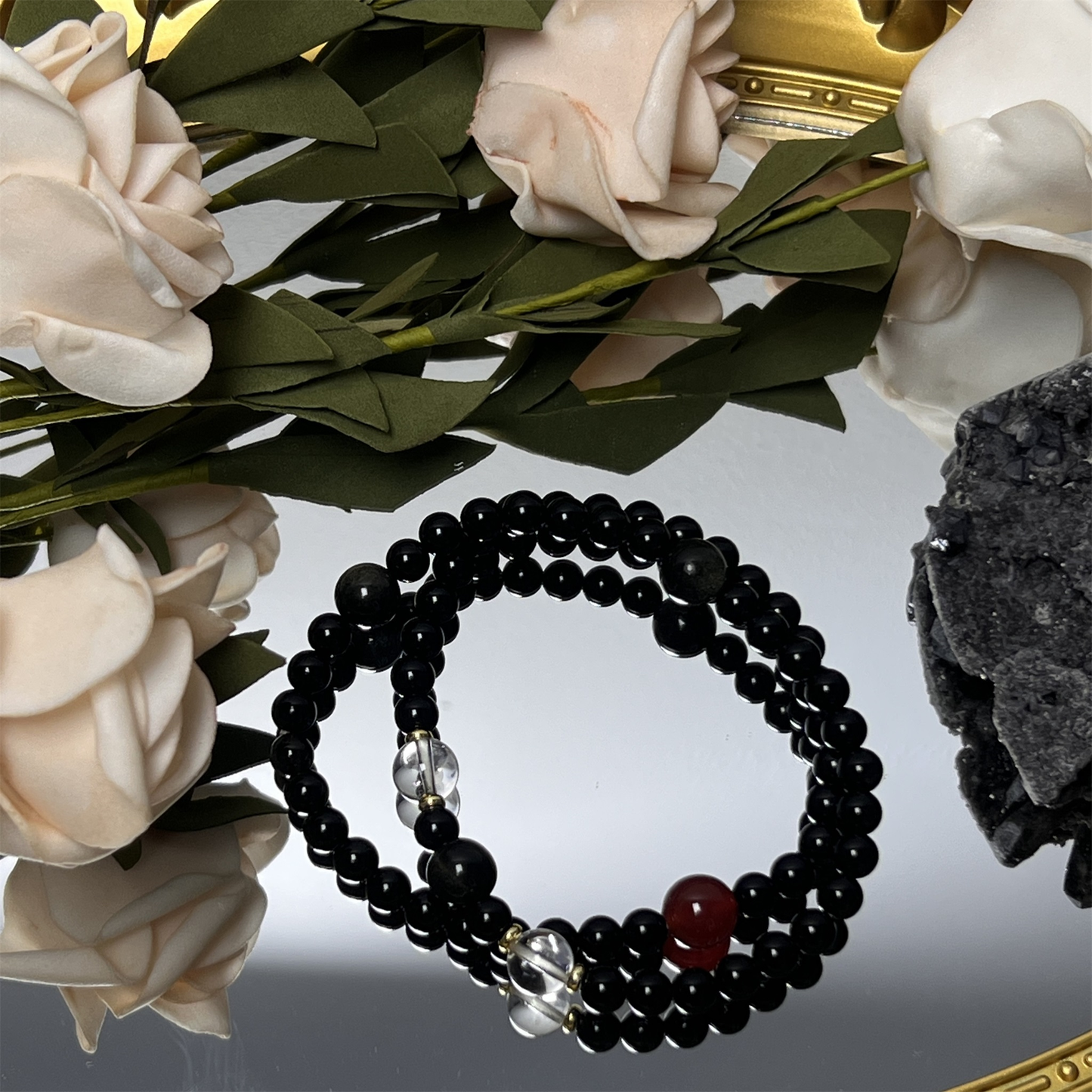 Multi-stone crystal bracelet showing obsidian, agate and quartz combination - Protection and balance jewelry