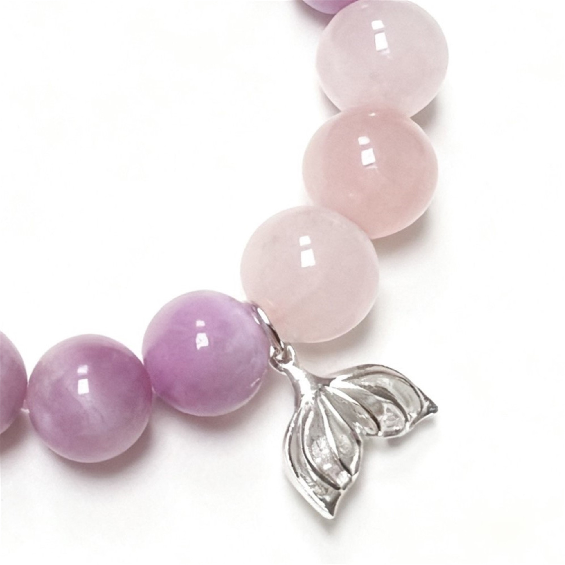 Fish Charm Detail on Rose Quartz Kunzite Bracelet - Unique Symbol of Freedom and Flow