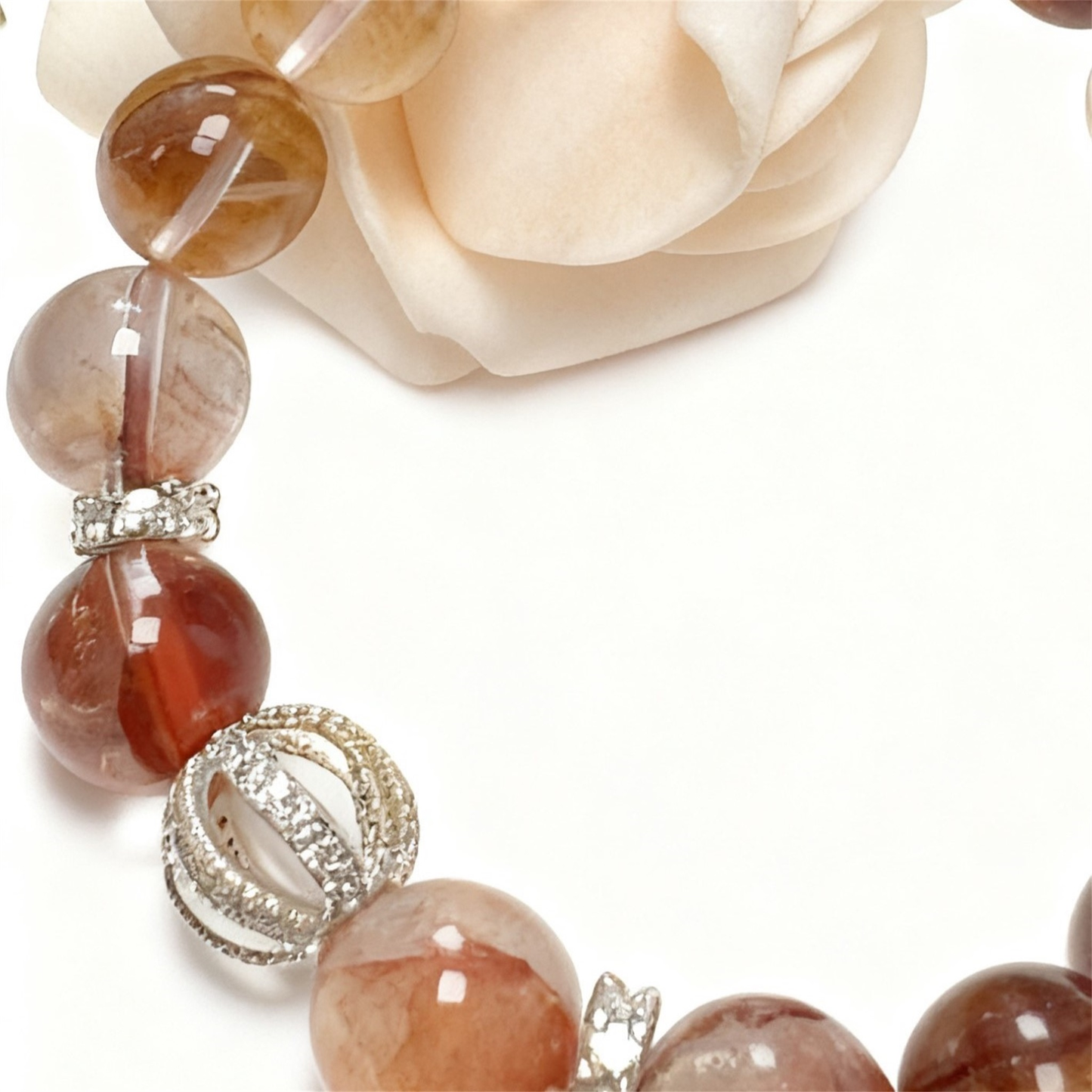 Close-up of garden quartz beads showing unique floral patterns and natural inclusions - Premium crystal bracelet detail